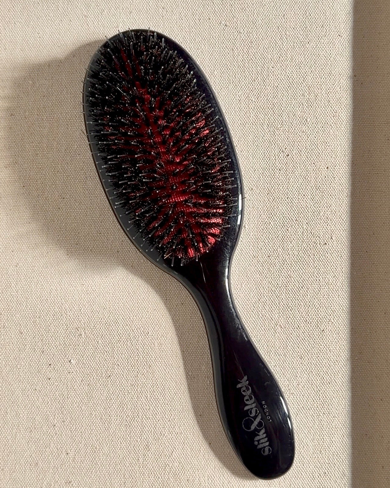 Black hair brush with mixed boar and nylon bristles for detangling and shine - Slik &amp; Sleek London luxury collection